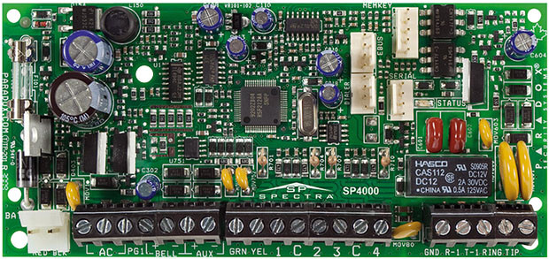 PARADOX SP4000 panel 4 (32) zóna, 2 partíció, StayD, kommunikátor, 1 PGM, doboz és kezelő nélkül.